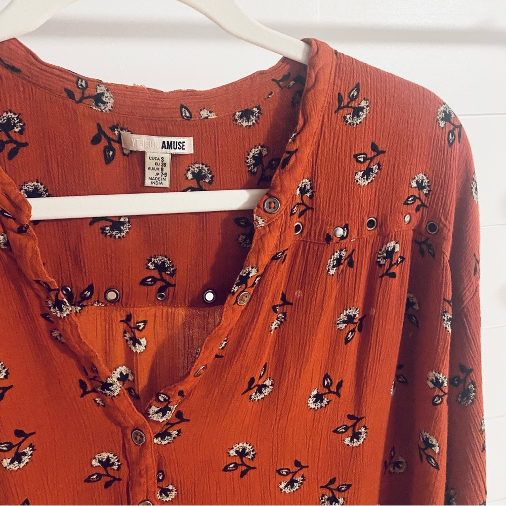 Women’s burnt orange floral top